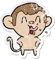distressed sticker of a crazy cartoon monkey