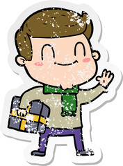 distressed sticker of a cartoon friendly man with xmas gift