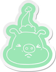 quirky cartoon  sticker of a angry pig face wearing santa hat