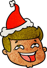 happy hand drawn textured cartoon of a male face wearing santa hat