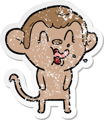 distressed sticker of a crazy cartoon monkey