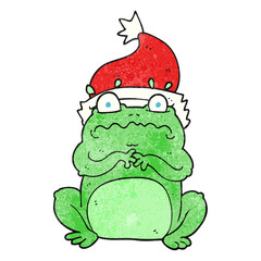 freehand textured cartoon frog in christmas hat