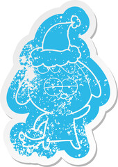 quirky cartoon distressed sticker of a bored dog wearing santa hat
