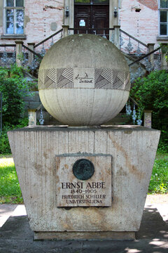 Jena, Germany - May 26, 2023: Monument to physicist and optical scientist Ernst Abbe in front of Jena University displays his formula for the resolution limit of the microscope.