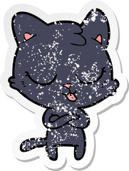 Obraz premium distressed sticker of a cartoon cat