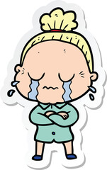 sticker of a cartoon crying old lady