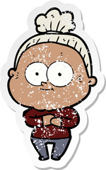 distressed sticker of a cartoon happy old woman