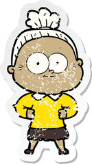 distressed sticker of a cartoon happy old woman