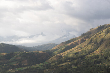 Obraz premium landscape with mountains, dramatic clouds, at sunset Andes, Peru.