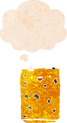 cartoon biscuit with thought bubble in grunge distressed retro textured style