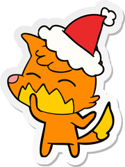 hand drawn sticker cartoon of a fox wearing santa hat