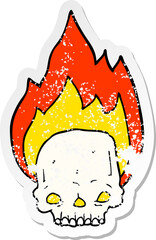 distressed sticker of a spooky cartoon flaming skull
