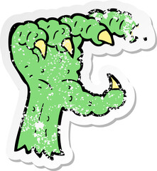 retro distressed sticker of a cartoon monster claw