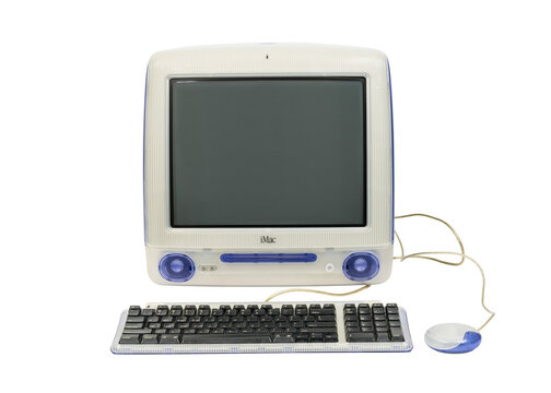 Los Angeles, California, USA - May 30, 2023:  Illustrative editorial photograph of vintage Apple iMac G3 desktop computer.  Computer was made in 1999.  Isolated with cut out background.