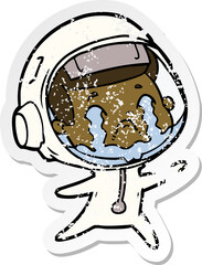 distressed sticker of a cartoon crying astronaut