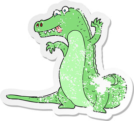 retro distressed sticker of a cartoon crocodile