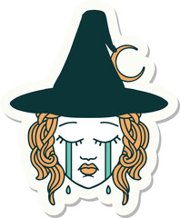 sticker of a crying human witch character