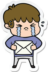 sticker of a cartoon boy crying