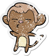 distressed sticker of a cartoon suspicious monkey