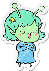 distressed sticker of a happy alien girl cartoon