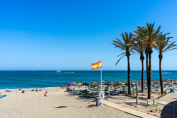 Walking on sea promenade in Benalmadena, Spain on May 7, 2023