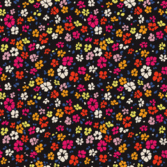 Fototapeta na wymiar Cute floral pattern in the small flowers. Seamless vector texture. Elegant template for fashion prints. Printing with small colorful flowers. Black background. Stock print.