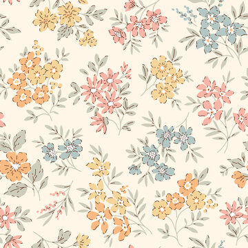 Vintage seamless floral pattern. Ditsy style background of small flowers. Small blooming flowers scattered over a ivory background. Stock vector for printing on surfaces and web design.