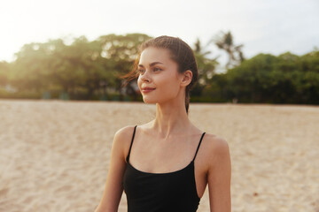 woman vacation sunset smile ocean lifestyle summer sand beach coast sea