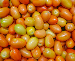 tomato in a pile as food background