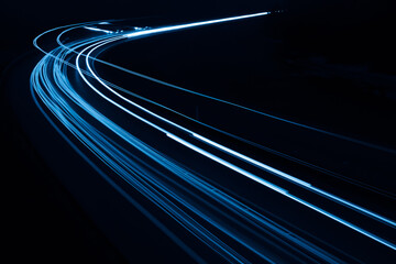 blue car lights at night. long exposure - obrazy, fototapety, plakaty