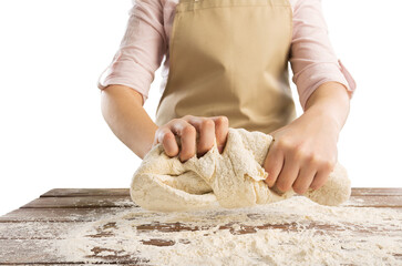 Making dough by female hands. Woman cooking.