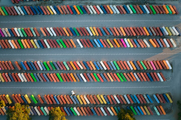 View from above of cargo container industrial yard with many shipment freight containers. Concept...