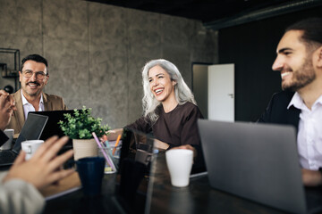 Happy Middle Eastern Colleagues Having Business Meeting In Office