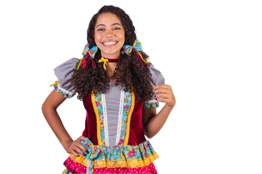 Black Brazilian woman wearing June party clothes, fraternization in the name of São João. Arraial posing for the photo.