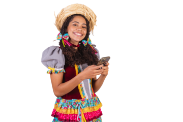 Black, Brazilian woman, wearing June party clothes, fraternization in the name of São João, Arraial. with smartphone