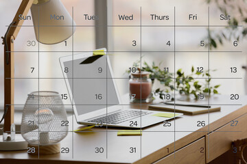 Transparent year 2023 calendar and modern laptop at workplace