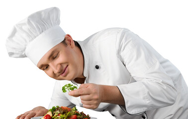 Chef garnishing a dish