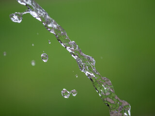 jet of water on a green background