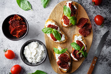 Ricotta dried tomato Basil bruschetta