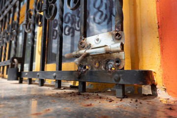 Lock on the lattice of the cottage window