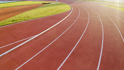 Athletic track with eight lanes on an outdoor stadium, drone shot