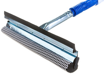colored household broom brush for home and car with a plastic handle and a scraper for a snow plow