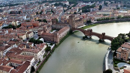 Aerial view of Verona city with the bridge over the adige river leading to Castelvecchio the castle...