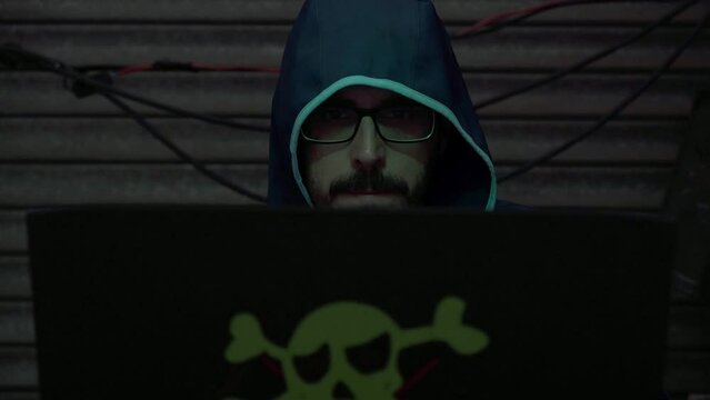 hacker from his hideout encrypting a security code
