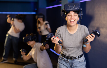 Portrait of a young woman with a very surprised look, who took off her virtual reality glasses