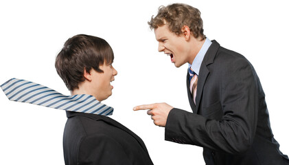 Young male businessman yelling at an employee