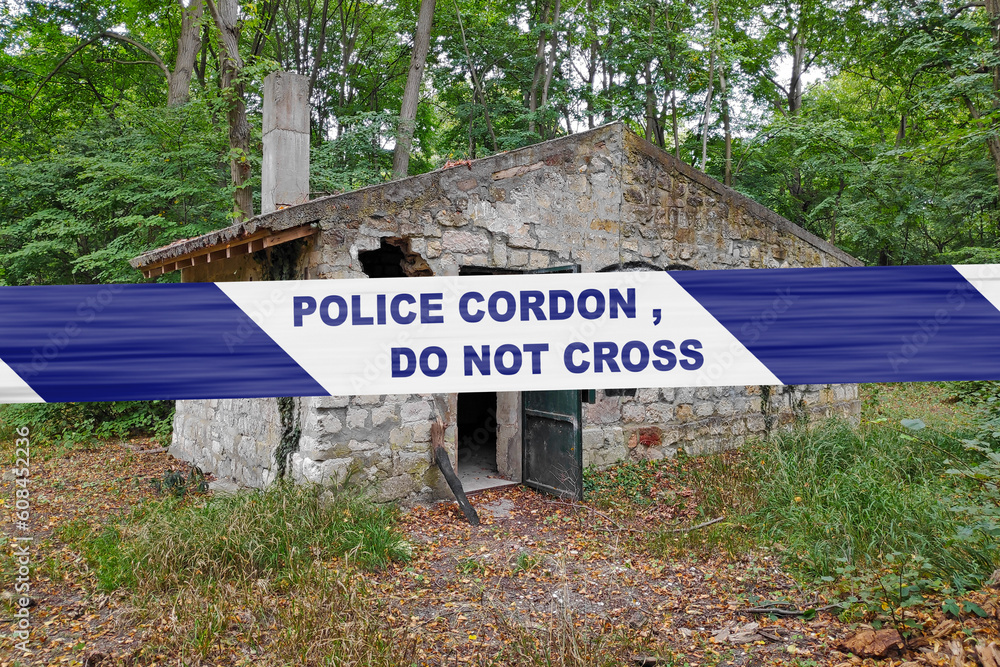 Wall mural South African police tape barricading an abandoned stone house