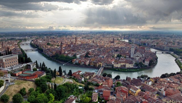 Aerial view of Verona city with the bridge over the adige river leading to Castelvecchio the castle of Verona. Veneto, Italy