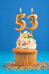 Birthday cake with candle number 53 - Blue background