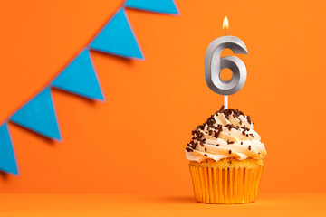 Candle number 6 - Cake birthday in orange background